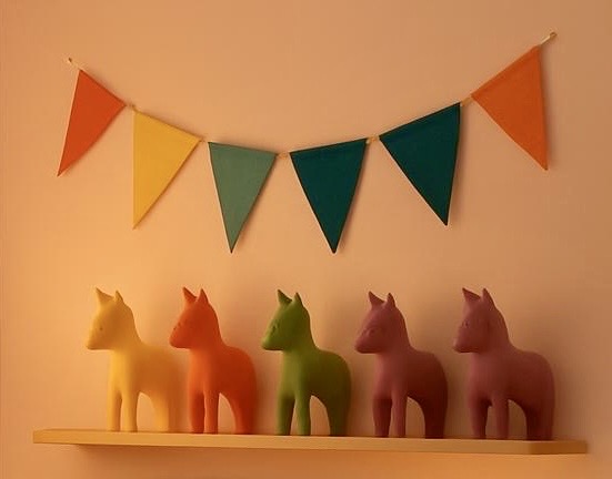 Three concrete eco resin horses/ponies shaped big, medium and small